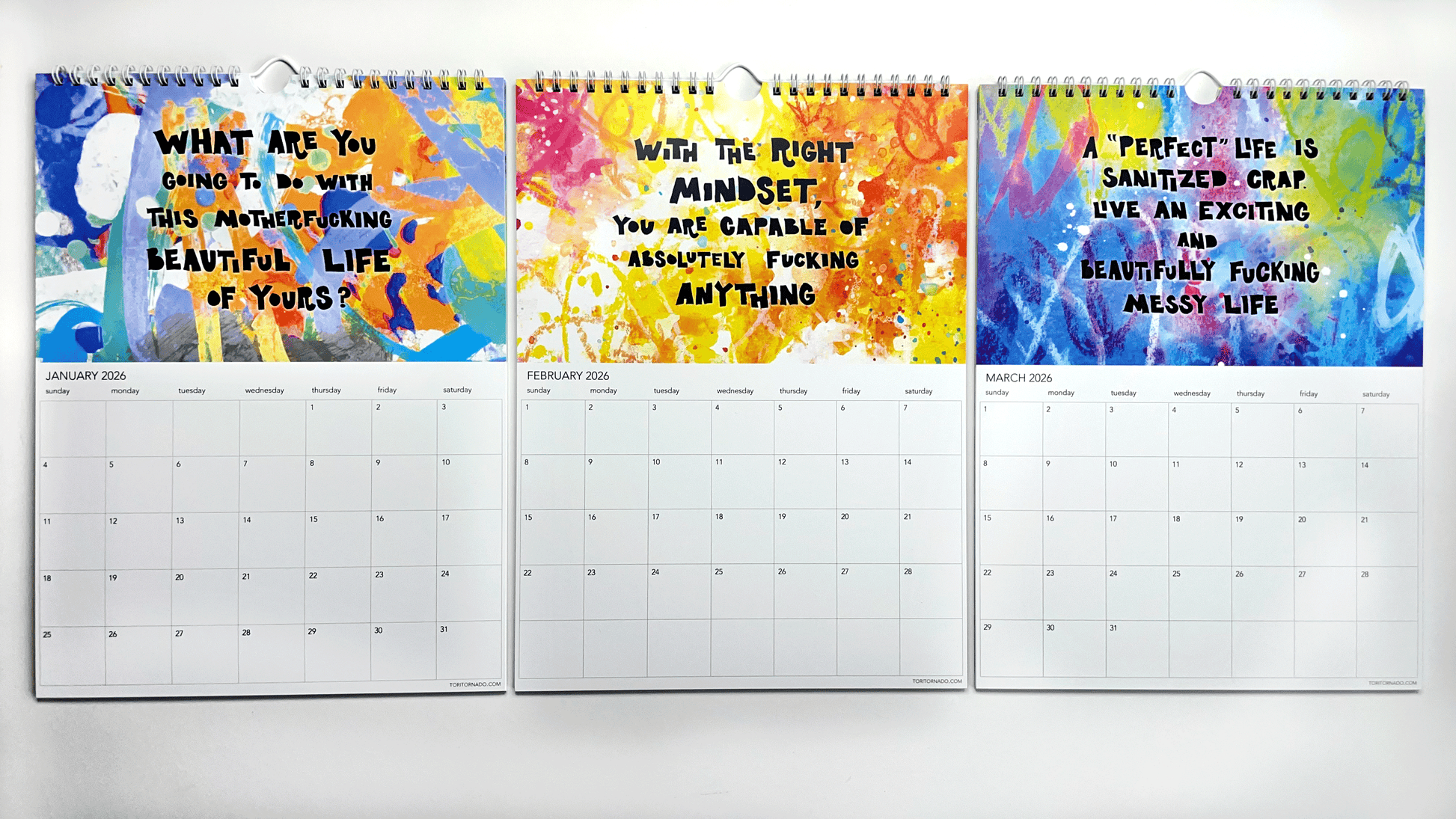 Three calendar pages with colorful fun positive swearing quotes text on a white background